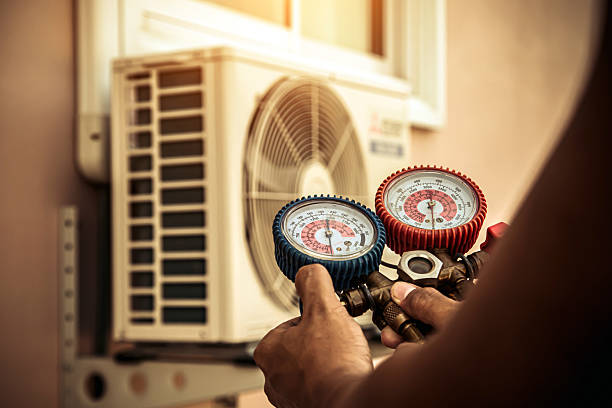Professional Hvac Maintenance technician working in Versailles, IN